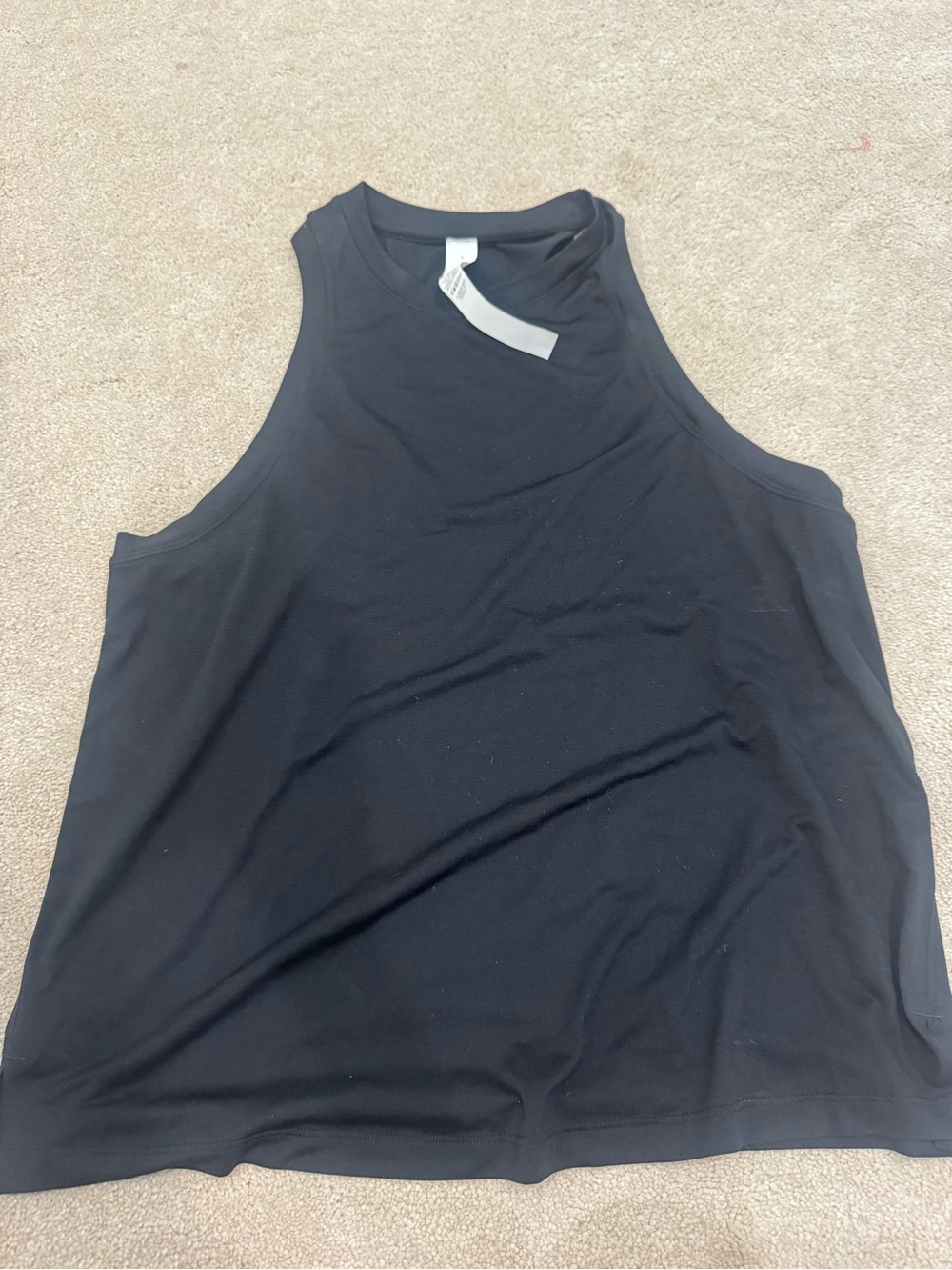Lululemon New Without tag....racerback muscle tank, size 8
